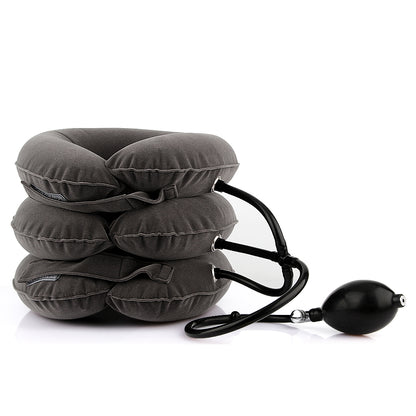 Inflatable neck rest with its hand pump and twist release valve