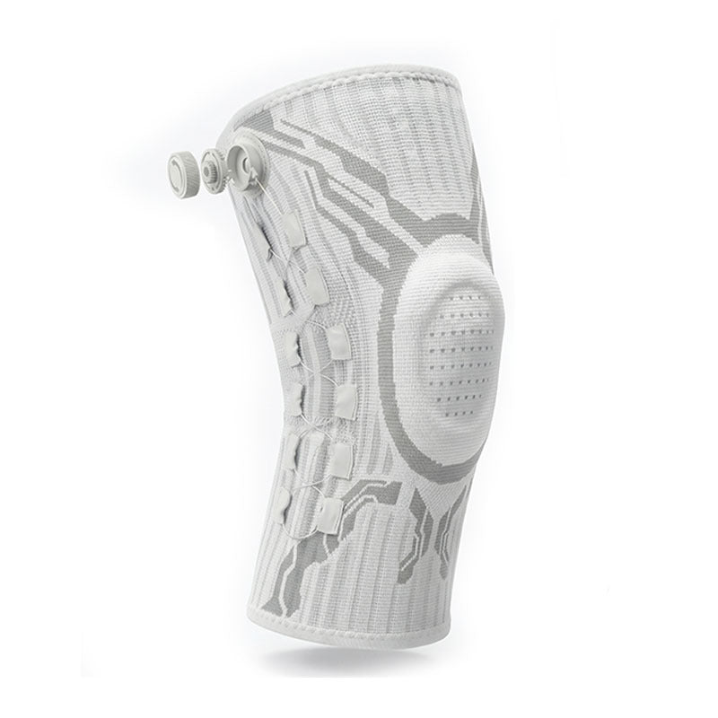 Adjustable knee support sleeve in white knit, front view showing the fit dial and cable lacing