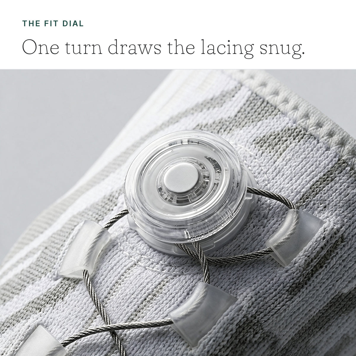 Close-up of the fit dial and cable lacing - one turn draws the lacing snug