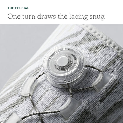 Close-up of the fit dial and cable lacing - one turn draws the lacing snug